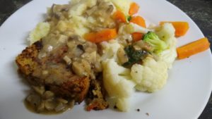 Lentil and Quinoa loaf with mushroom sauce